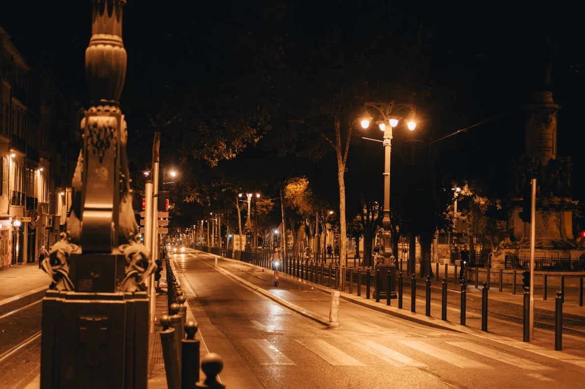A City Street At Night With Street