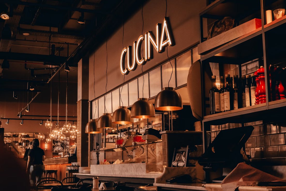 A Restaurant With A Large Sign