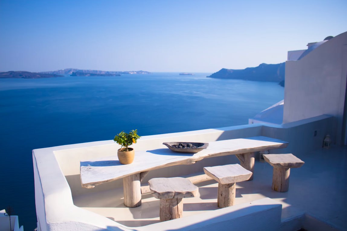Bench And Dining Table Near Body Of Water Under Calm