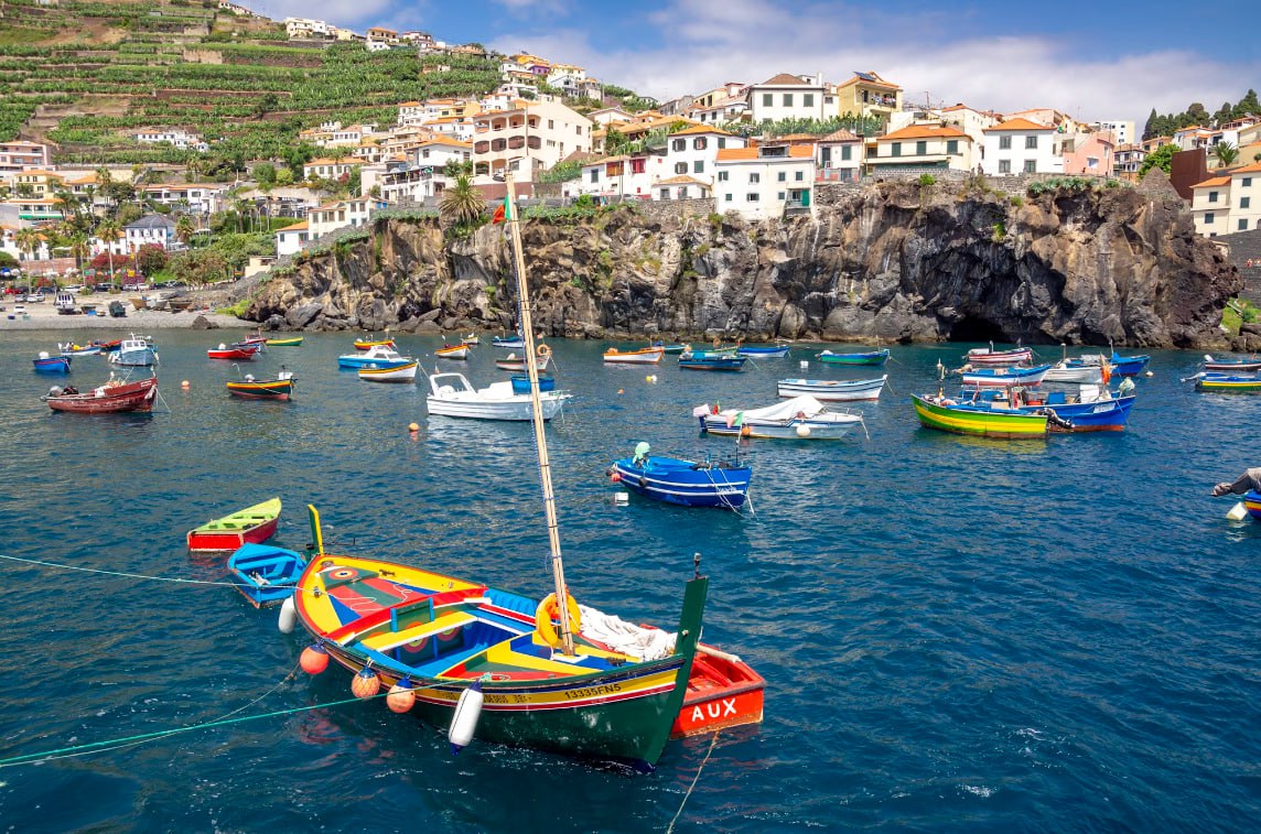 Green And Yellow Boat On Body Of Water During Daytime