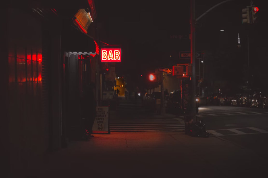 Lighted Bar Signage During Nighttime