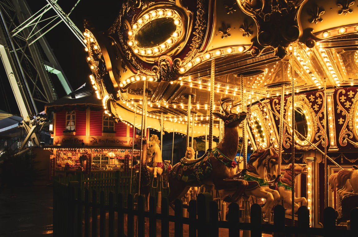 Lighted Carnaval During Nighttime Taxi