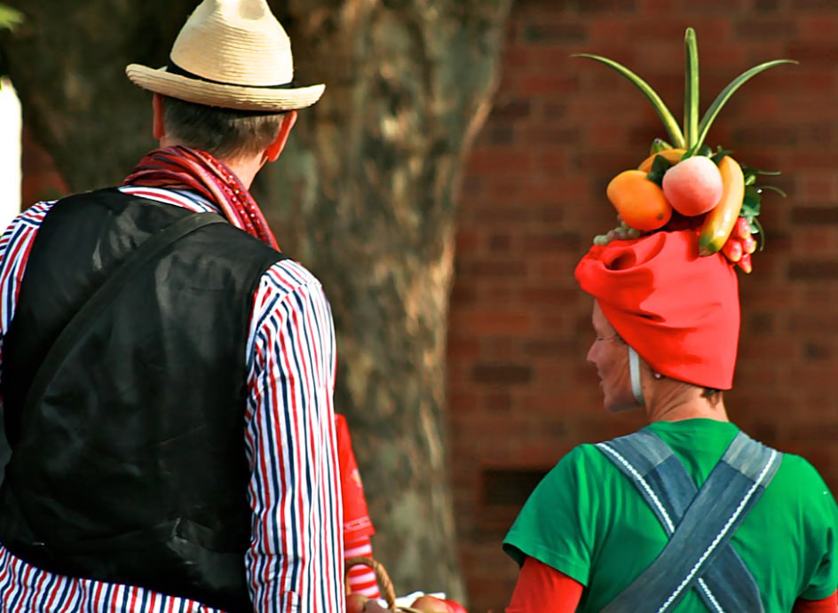 Man In Red Hat Holding Apple Fruit