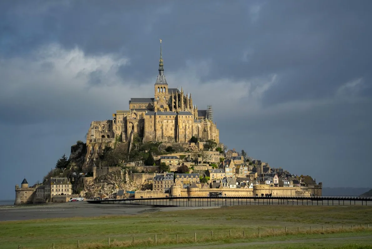 mont-saint-michel-a-very-large-castle-with-a-lot-of-buildings-on-top