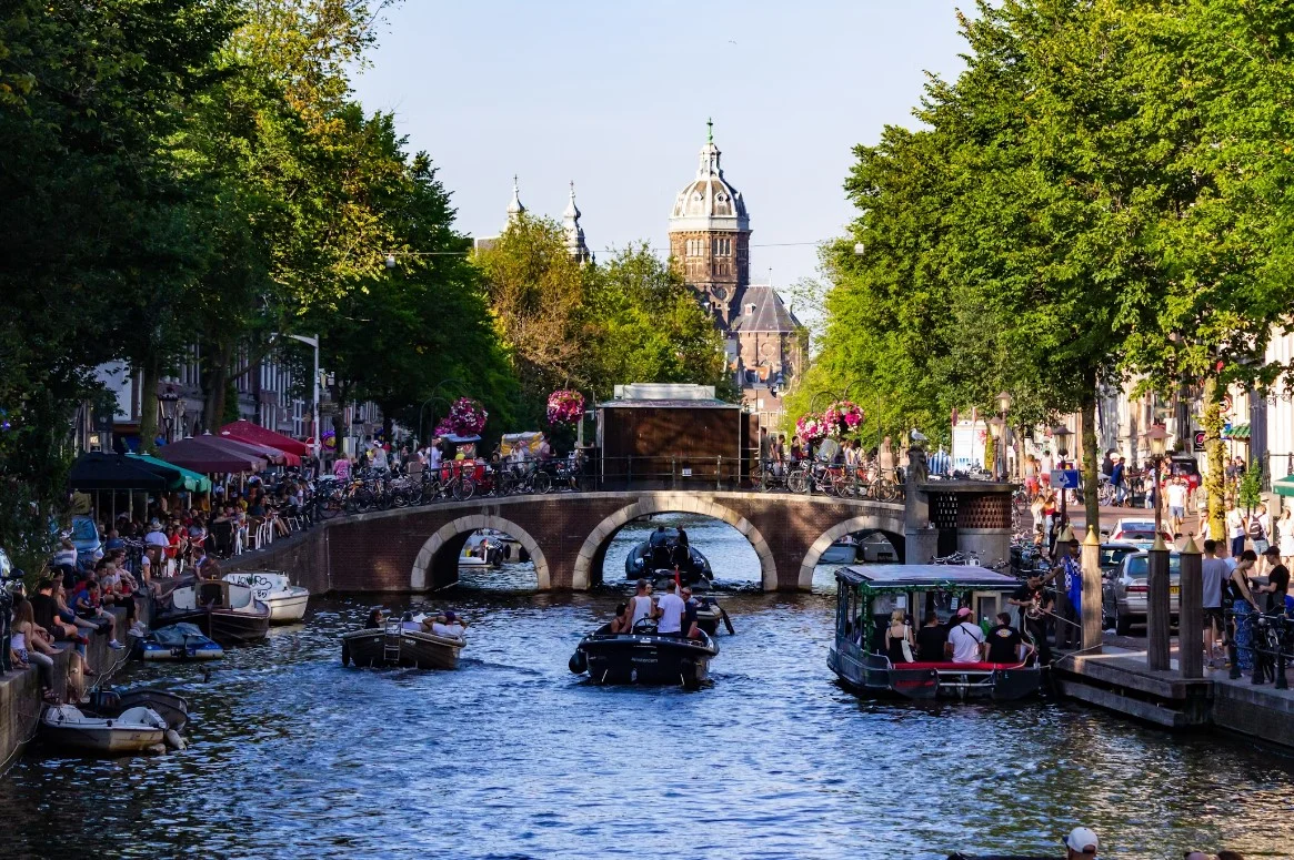 People Riding On Boat On River During Daytime