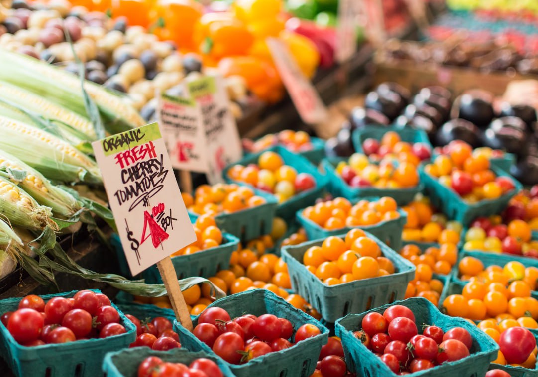 Red Tomato Lot On Blue Baskets