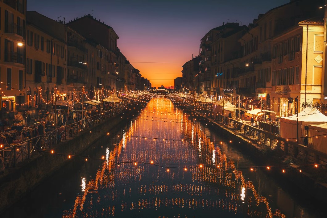 Reflective Photography Of String Lights Above River