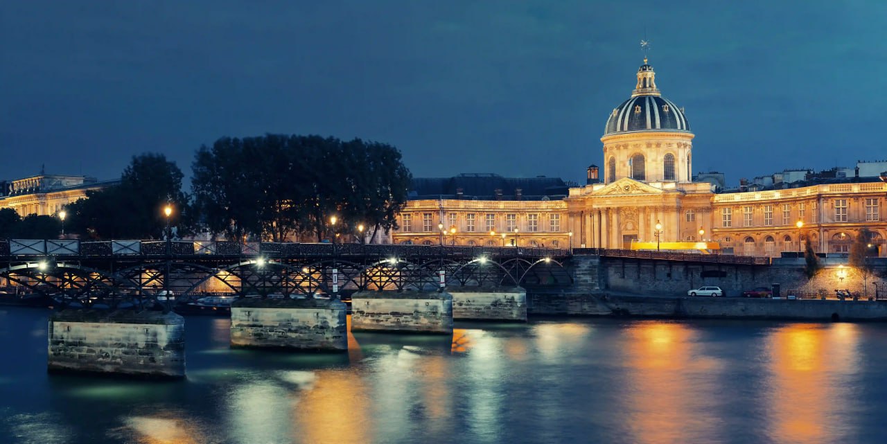 river_seine_with_pont_des_arts_institut_de_france_panorama_night_paris_france
