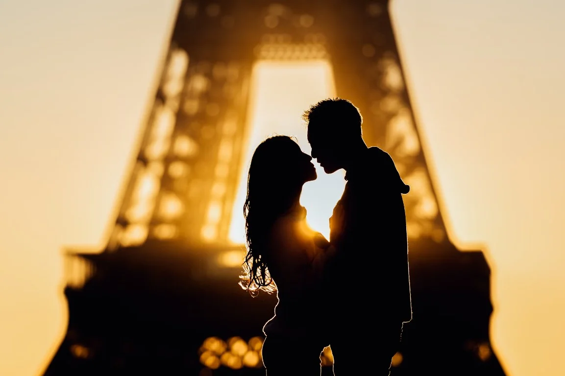 Silhouette Of Man And Woman Kissing During Sunset