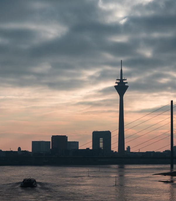 Silhouette Of Tower Under Nimbus Clouds