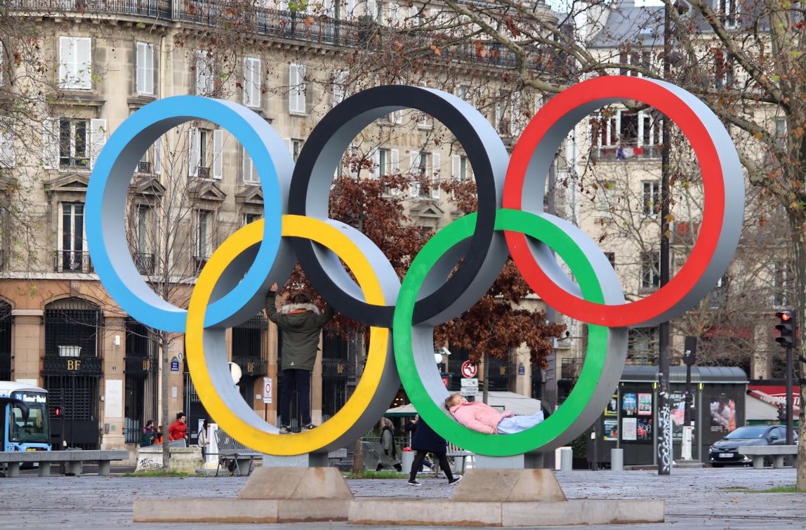 The Olympic Rings Stand In A City Square