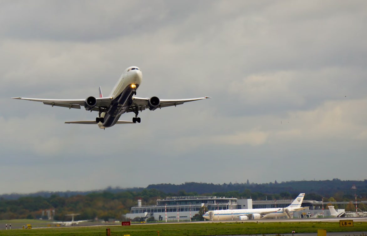 White Airplane On Airport During Daytime